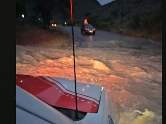 Dubai_Police_Saves_Five_Vehicles_from_Being_Swept_Away_by_Floods_in_Hatta_(-1707926750091