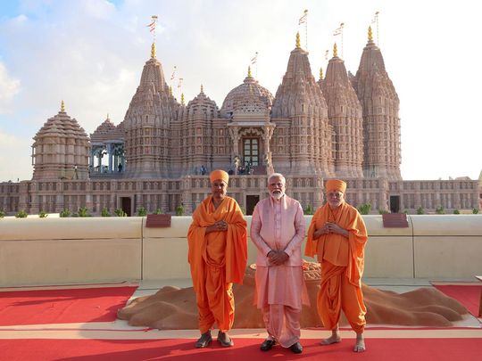 Indian Prime Minister Narendra Modi (centre) in front of the BAPS Hindu Mandir in Abu Dhabi on Feb 24, 2024