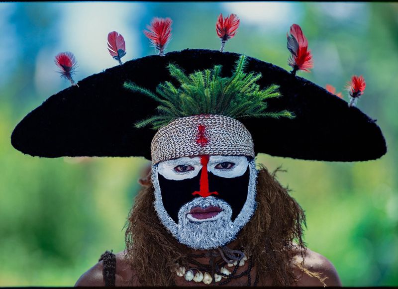 Hat Man, New Guinea - Copyrights to Eric Meola