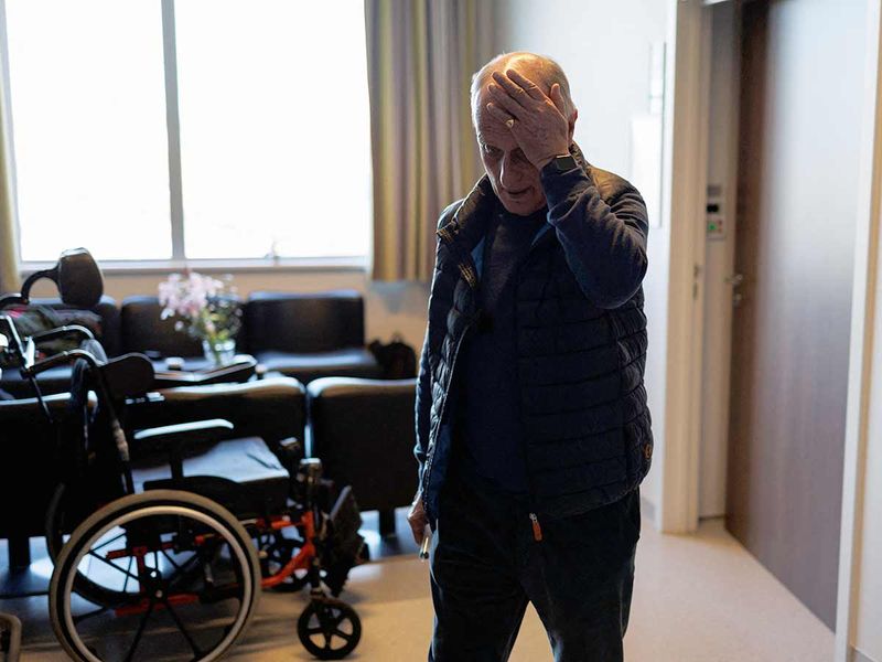  Doctor Yves de Locht reacts as walks out of the hospital room after the euthanasia of Lydie Imhoff at a hospital in Belgium, on February 1, 2024. 