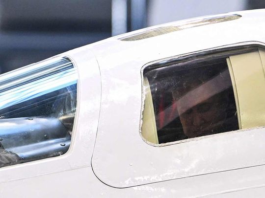 In this pool photograph distributed by Russian state agency Sputnik, Russia's President Vladimir Putin is seen in the cockpit of a Tupolev Tu-160M strategic bomber while visiting the Gorbunov Kazan Aviation Plant in Kazan on February 21, 2024. 