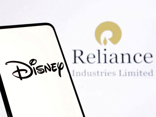 Disney and Reliance logos are seen in this illustration taken December 15, 2023.