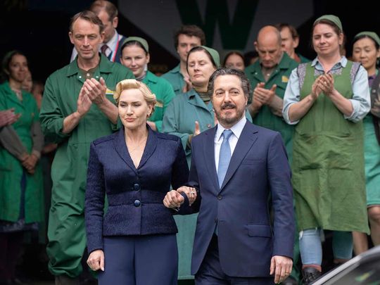 This image released by HBO shows Kate Winslet, left, and Guillaume Gallienne in a scene from 'The Regime.' 