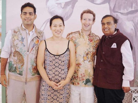 Meta CEO Mark Zuckerberg and his wife Priscilla Chan pose with Mukesh Ambani