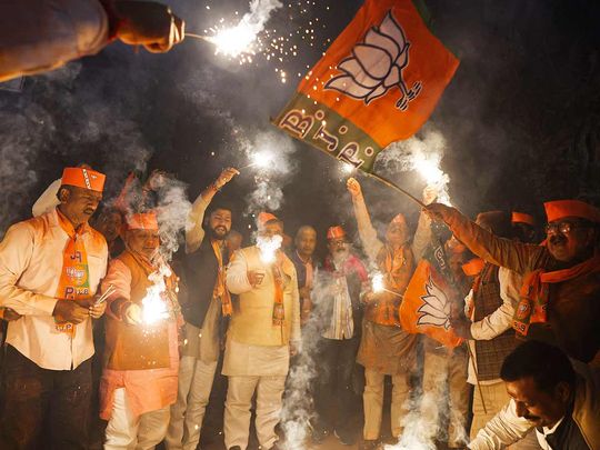 Supporters of India's Bhartiya Janata Party (BJP) celebrate