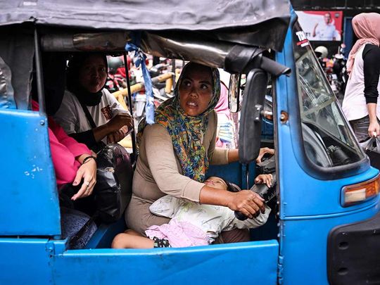 Autorickshaw driver and single mother Ekawati