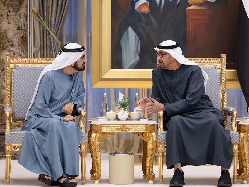UAE President His Highness Sheikh Mohamed bin Zayed Al Nahyan (right), speaks with His Highness Sheikh Mohammed bin Rashid Al Maktoum, UAE Vice President, Prime Minister and Ruler of Dubai (left), during an iftar reception, at Qasr Al Watan. 