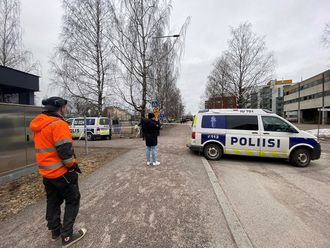 A police cordon stands outside Viertola school in Vantaa, after a shooting took place there earlier in the day, in a suburb of the capital Helsinki, Finland on April 2, 2024. 