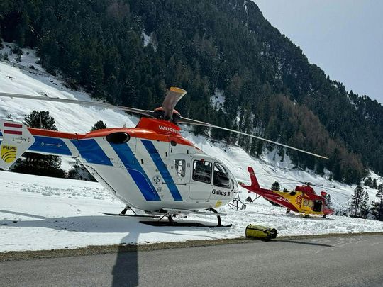 Helicopters of the emergency services are pictured in Vent, near Soelden, Austria after an avalanche occurred, on April 11, 2024.  