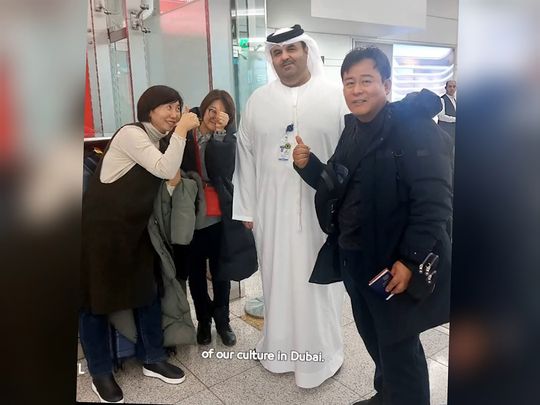 Marwan-Al-Habsi-with-the-3-Korean-passengers-he-helped-at-DXB-recently-pic-from-DXB-video-on-X-1713003178472