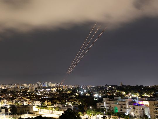An anti-missile system operates after Iran launched drones and missiles towards Israel, as seen from Ashkelon, Israel April 14, 2024. 