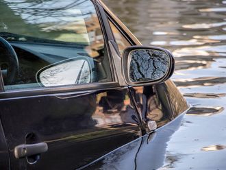 STOCK car stuck rain flood water