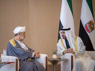 President His Highness Sheikh Mohamed bin Zayed Al Nahyan (R) receives Sultan Haitham bin Tariq of Oman (L) upon arrival at the Presidential Airport commencing a state visit on Monday