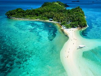 Aslom Island, in Oriental Mindoro Province, Philippines.
