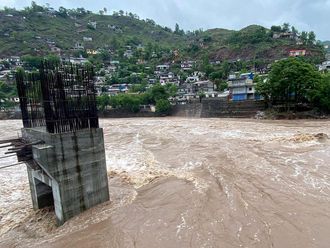A general view of an overflowing Jhelum River after heavy rainfall in Muzaffarabad in Pakistan-administered Kashmir on April 29, 2024.