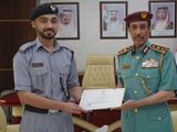 ajman-police-chief-honours-police-officer-1715323552950