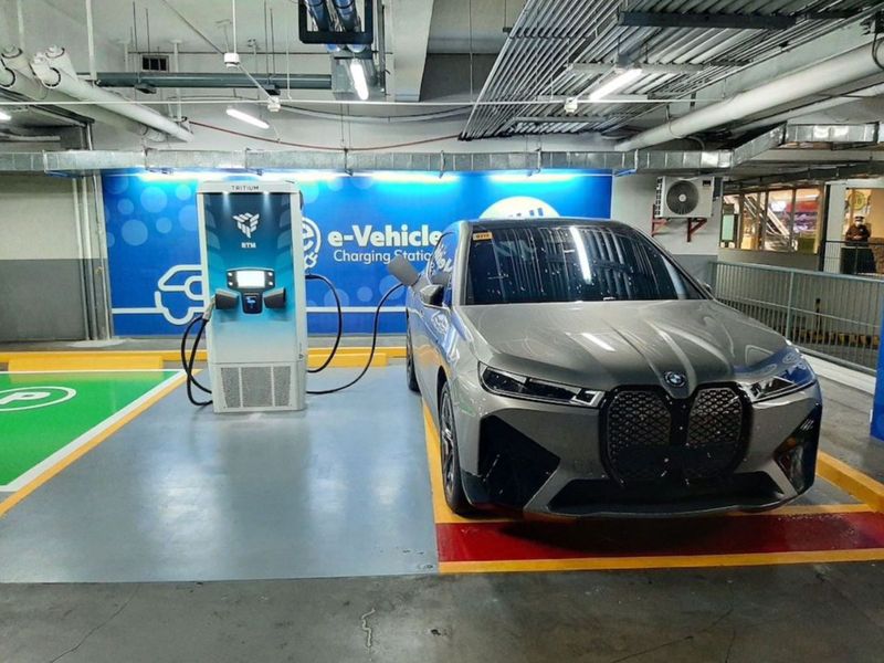 An EV charging station at a mall parking lot in the Philippines.