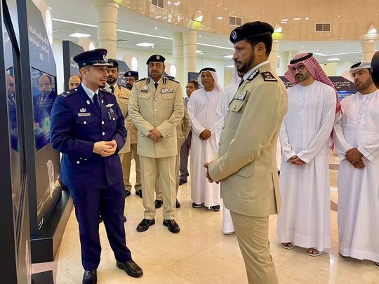shj-police-chief-(R)-briefed-on-presentation-from-qatar-police-academy-1716394751420