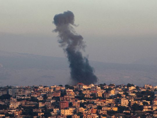 Smoke billows from the site of an Israeli airstrike 