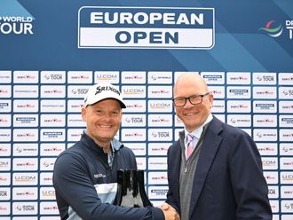 Søren Kjeldsen is presented with a gift to commemorate his 700th tournament by Guy Kinnings, the European Tour group's Chief Executive