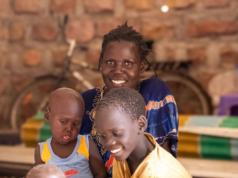 A-family-in-their-new-house-in-the-Kalobeyei-settlement-northern-Kenya-(1)-1717478739286