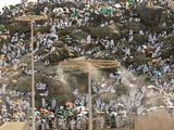 Mist dispensers refreshen pilgrims as they walk up Saudi Arabia's Mount Arafat