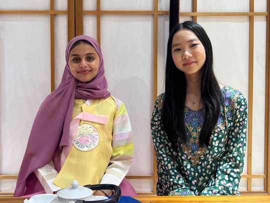 Ghaya Al Ababi with Grace Jooeun Choi, a student from Korea, at the Korean Cultural Center in Abu Dhabi.