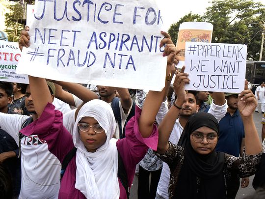 OPN Students stage a protest against the alleged irregularities in the NEET-UG examination results and demand re-examination, in Kolkata on Monday