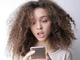 Young girl using a smart phone