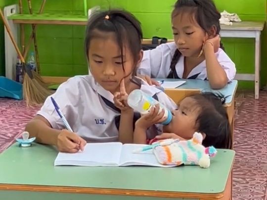 Thai girl with younger sister