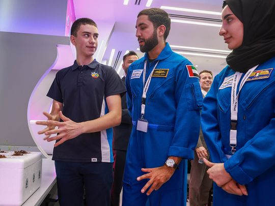 Emirati astronauts Mohammad Al Mulla and Nora Al Matrooshi being briefed by student Stepan Litvichenko about the Space Lab at GEMS International School – Al Khail in Dubai on Thursday