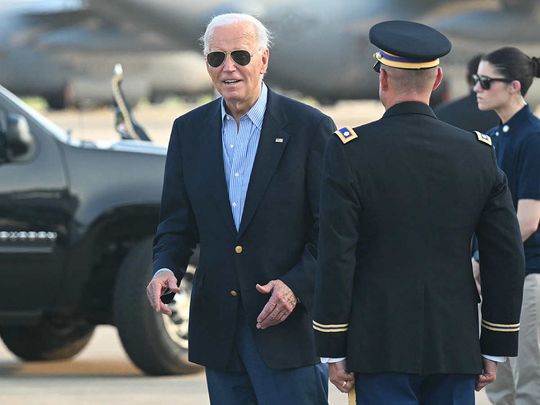 US President Joe Biden disembarks from Air Force One upon arrival at Delaware Air National Guard Base in New Castle, Delaware, July 5, 2024, as he travels to his home in Wilmington, Delaware.