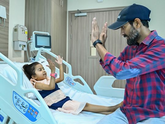 Razia Khan, the UAE's first pediatric liver transplant recipient, along with her father at Burjeel Medical City-1720588718052
