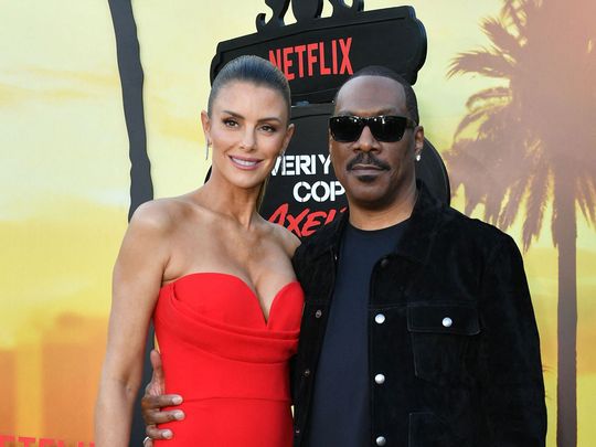 US actor Eddie Murphy and partner actress Paige Butcher