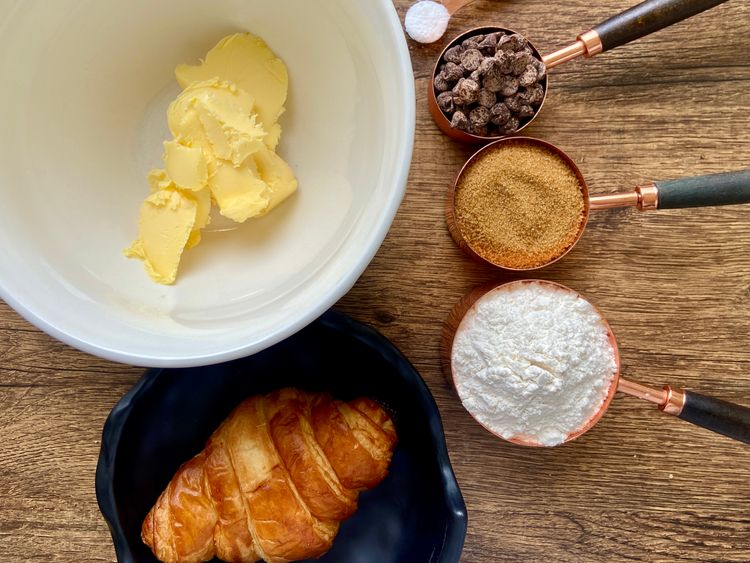 To make the viral cookie, you will need: butter, brown sugar, egg, all-purpose flour, cornstarch, baking soda, chocolate chips, and vanilla.