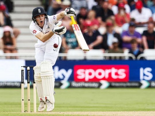 England's Harry Brook is struck by a ball 