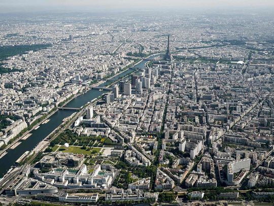 This aerial photograph shows the Seine river and the Eiffel Tower, in Paris. 