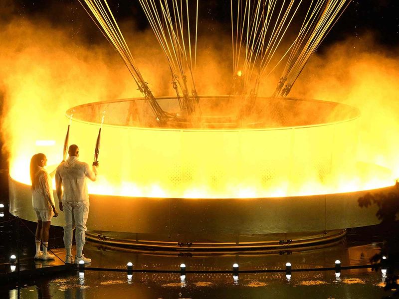 The cauldron, with the Olympic flame lit