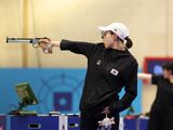 Kim Ye-ji of South Korea, who won silver at the 10-meter air pistol event, went viral for her style.
