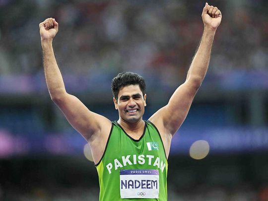 Pakistan's Arshad Nadeem reacts as he competes in the men's javelin throw final 