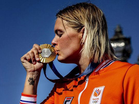 De Nederlandse zwemster Van Ruwendaal draagt ​​de Olympische gouden medaille op aan haar overleden hond