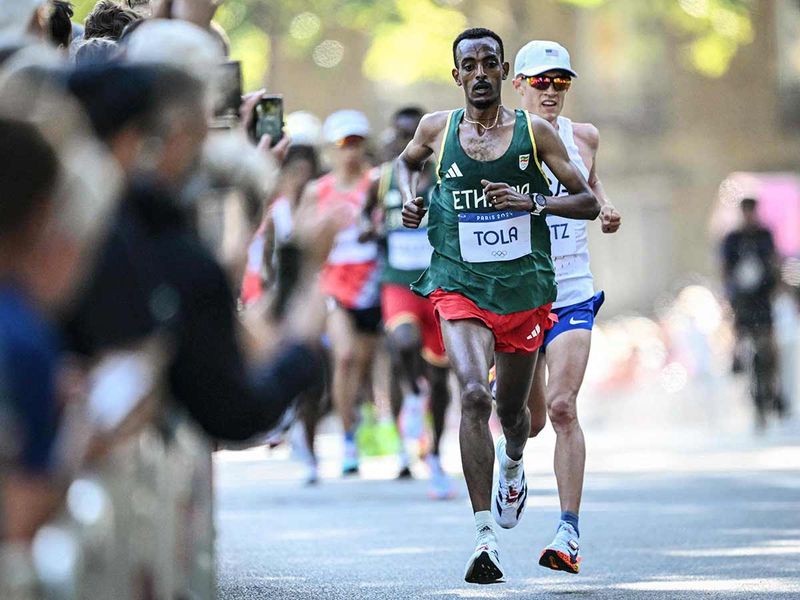 Ethiopia's Tamirat Tola competes in the men's marathon