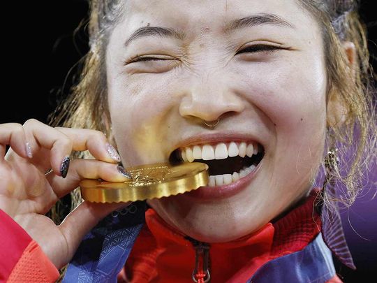 Gold medallist Japan's Ami Yuasa known as Ami poses 