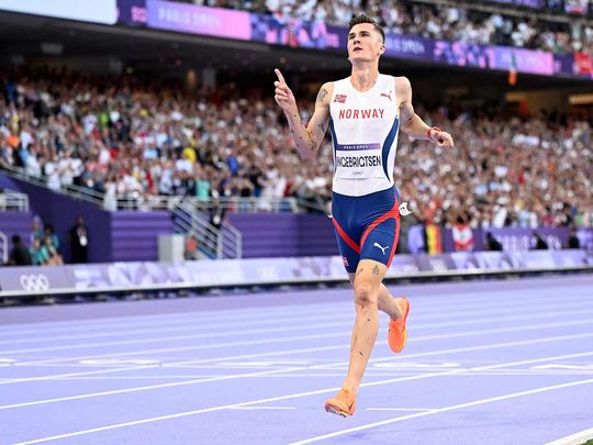 Gold medallist Norway's Jakob Ingebrigtsen celebrates after winning in the men's 5000m final