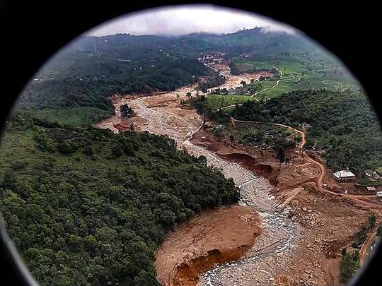 Prime Minister Narendra Modi (unseen) conducts an aerial survey of the landslide-affected areas, in Wayanad 