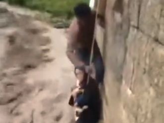 Gripping video: Yemeni man saves woman and child from torrential floods