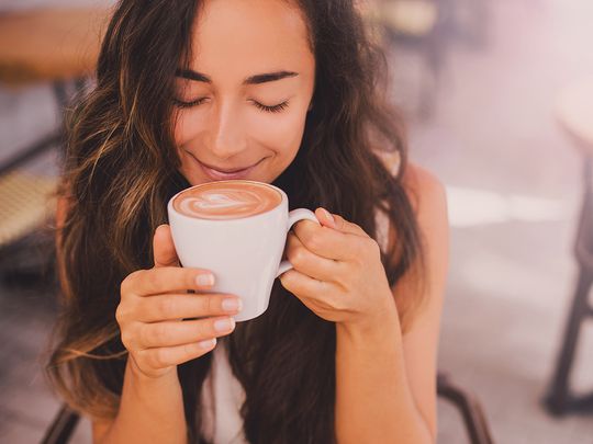 Person and coffee