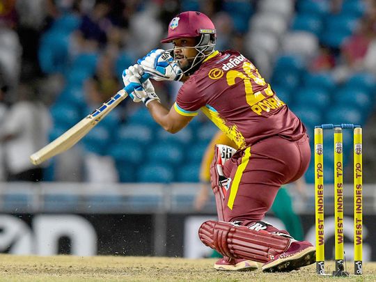 Nicholas Pooran of West Indies hits a boundary 