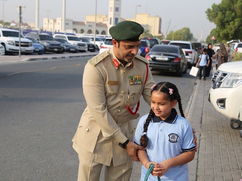 Dubai Police were managing the inflow of students, buses and family cars as the new school year began