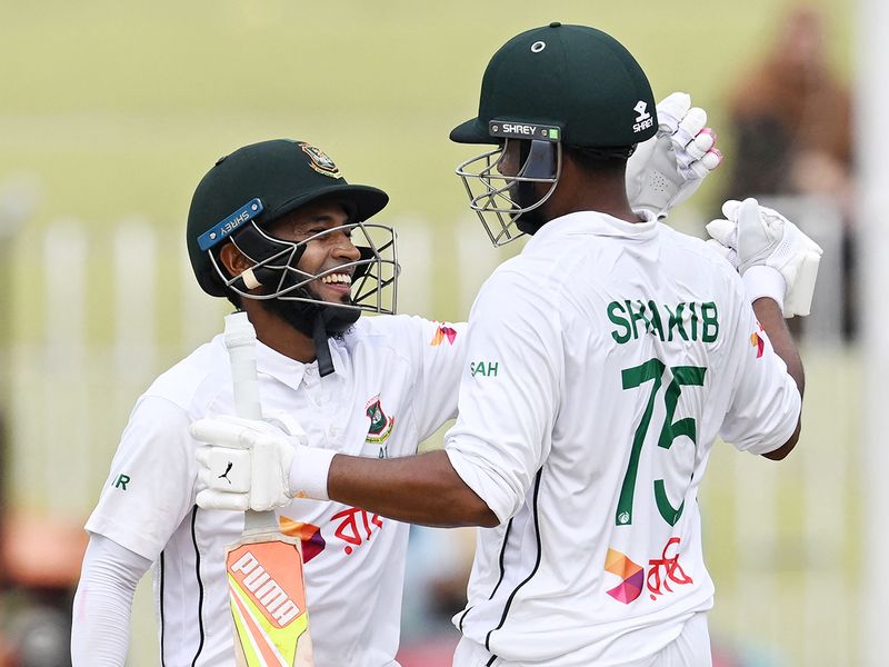 Bangladesh's Mushfiqur Rahim (L) and Shakib Al Hasan celebrate